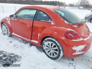 2017 Volkswagen Beetle 1.8T SE with VIN 3VWJ17AT3HM624934, listed as a IAAI auction lot 41389551 with 29,109 mi miles. Bid and sale history available at carsss.com. Image 3.