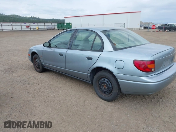2002 Saturn SL z VIN 1G8ZS52842Z289815, wystawiony jako IAAI lot #42557607 z przebiegiem 184 671 mil mil oraz . Historia ofert i sprzedaży dostępna na DreamBid. Obrazek 3.