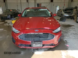2020 Ford Fusion SE z VIN 3FA6P0LU3LR144513, wystawiony jako Copart lot #62904305 z przebiegiem 160 372 mil mil oraz Szkoda całkowita • Salvage title. Historia ofert i sprzedaży dostępna na DreamBid. Obrazek 5.