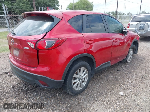 2016 Mazda CX-5 Sport with VIN JM3KE2BYXG0668401, listed as a IAAI auction lot 42370910 with Not provided miles and . Bid and sale history available at DreamBid. Image 4.