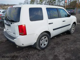 2009 Honda Pilot LX with VIN 5FNYF48239B051599, listed as a IAAI auction lot 41889469 with 999,999 mi miles. Bid and sale history available at carsss.com. Image 4.