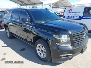 2019 Chevrolet Suburban LT z VIN 1GNSCJKCXKR332739, wystawiony jako IAAI lot #41636530 z przebiegiem 104 997 mil mil oraz . Historia ofert i sprzedaży dostępna na DreamBid. Obrazek 1.