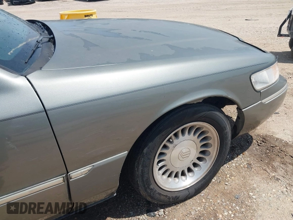 2002 Mercury Grand Marquis LS Premium z VIN 2MEFM75W22X617584, wystawiony jako IAAI lot #42444579 z przebiegiem 199 914 mil mil oraz . Historia ofert i sprzedaży dostępna na DreamBid. Obrazek 6.