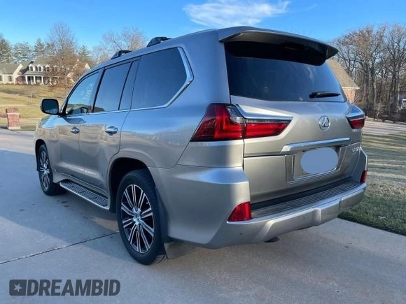 2020 Lexus LX 570 with VIN JTJDY7AX7L4332820, listed as a Copart auction lot 52223565 with 102,417 mi miles and Clean title. Bid and sale history available at DreamBid. Image 3.