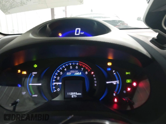 2012 Honda Insight EX with VIN JHMZE2H71CS003132, listed as a IAAI auction lot 42582548 with 112,593 mi miles and . Bid and sale history available at DreamBid. Image 15.