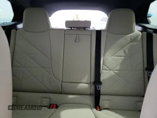 2025 BMW iX xDrive50 z VIN WB523CF06SCT06612, wystawiony jako Copart lot #47318365 z przebiegiem 2 297 mil mil oraz Szkoda całkowita • Salvage title. Historia ofert i sprzedaży dostępna na DreamBid. Obrazek 10.