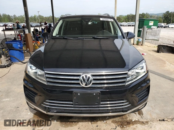2016 Volkswagen Touareg Sport with VIN WVGEF9BP3GD007543, listed as a Copart auction lot 52806715 with 121,404 mi miles and Salvage Title. Bid and sale history available at DreamBid. Image 5.
