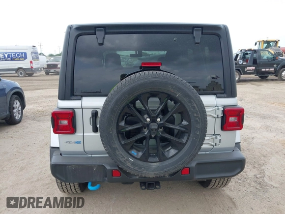 2023 Jeep Wrangler Sahara with VIN 1C4JJXP62PW627455, listed as a IAAI auction lot 42115137 with 62,143 mi miles and . Bid and sale history available at DreamBid. Image 16.