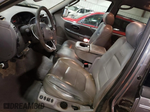2002 Ford F-150 XLT with VIN 1FTRW08L92KD19411, listed as a Copart auction lot 50986795 with 164,556 mi miles and Clean Title. Bid and sale history available at carsss.com. Image 7.