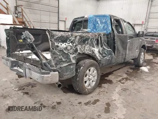 2014 Ford F-150 XL with VIN 1FTFX1ET8EKE32412, listed as a IAAI auction lot 41557331 with 128,744 mi miles. Bid and sale history available at carsss.com. Image 4.