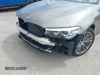 2018 BMW 5 Series 530i xDrive with VIN WBAJA7C55JG909519, listed as a IAAI auction lot 42650263 with 57,077 mi miles and . Bid and sale history available at DreamBid. Image 6.