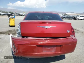 2010 Chrysler 300 with VIN 2C3CA2CV4AH330352, listed as a Copart auction lot 70720414 with 164,673 mi miles and Salvage Title. Bid and sale history available at carsss.com. Image 6.