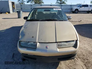 1995 Saturn SL with VIN 1G8ZH5288SZ350078, listed as a Copart auction lot 49236475 with 54,621 mi miles and Salvage title. Bid and sale history available at DreamBid. Image 5.