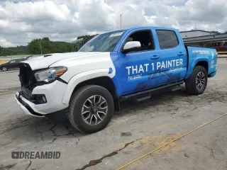 2023 Toyota Tacoma SR with VIN 3TMCZ5AN2PM577873, listed as a Copart auction lot 57361315 with 50,110 mi miles and Salvage title. Bid and sale history available at DreamBid. Image 1.