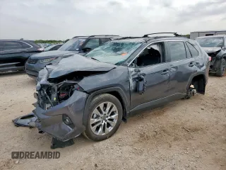 2023 Toyota RAV4 XLE Premium with VIN 2T3A1RFV9PW404607, listed as a Copart auction lot 57882525 with 19,710 mi miles and Salvage title. Bid and sale history available at DreamBid. Image 1.