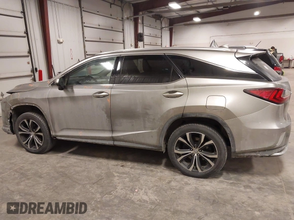2018 Lexus RX 350L Premium z VIN JTJDZKCA6J2004385, wystawiony jako IAAI lot #41382429 z przebiegiem 111 638 mil mil oraz . Historia ofert i sprzedaży dostępna na DreamBid. Obrazek 15.