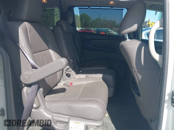 2013 Honda Odyssey Touring with VIN 5FNRL5H96DB009694, listed as a IAAI auction lot 42002487 with 182,867 mi miles and . Bid and sale history available at carsss.com. Image 8.