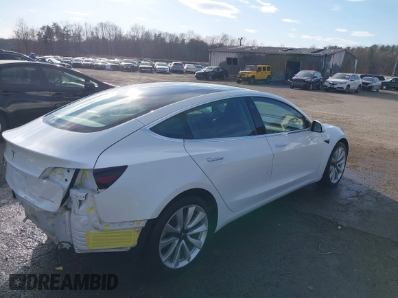 2019 Tesla Model 3 Long Range with VIN 5YJ3E1EB7KF442390, listed as a IAAI auction lot 41700122 with 65,539 mi miles. Bid and sale history available at carsss.com. Image 4.