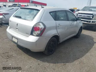 2009 Pontiac Vibe w/1SB with VIN 5Y2SP67039Z432930, listed as a IAAI auction lot 41951405 with 211,339 mi miles. Bid and sale history available at carsss.com. Image 4.