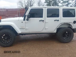 2014 Jeep Wrangler Unlimited Sahara z VIN 1C4BJWEG6EL245986, wystawiony jako IAAI lot #41498492 z przebiegiem 125 882 mil mil oraz . Historia ofert i sprzedaży dostępna na DreamBid. Obrazek 15.
