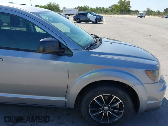 2017 Dodge Journey SE z VIN 3C4PDCAB1HT573511, wystawiony jako IAAI lot #41984865 z przebiegiem 128 721 mil mil oraz . Historia ofert i sprzedaży dostępna na DreamBid. Obrazek 18.