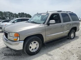 2003 GMC Yukon SLT z VIN 1GKEC13Z53J281504, wystawiony jako Copart lot #57526355 z przebiegiem 268 306 mil mil oraz Szkoda całkowita • Salvage title. Historia ofert i sprzedaży dostępna na DreamBid. Obrazek 1.