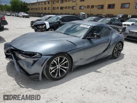 2020 Toyota Supra 3.0 with VIN WZ1DB4C02LW030327, listed as a Copart auction lot 61451485 with 85,250 mi miles and Salvage title. Bid and sale history available at DreamBid. Image 1.