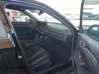 2025 Honda Civic Sport z VIN 19XFL2H89SE018384, wystawiony jako IAAI lot #42007336 z przebiegiem 3 782 mil mil oraz . Historia ofert i sprzedaży dostępna na DreamBid. Obrazek 5.