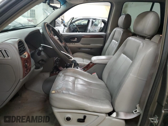 2005 GMC Envoy SLE with VIN 1GKDS13S952383743, listed as a Copart auction lot 43797315 with 185,833 mi miles and Salvage title. Bid and sale history available at DreamBid. Image 7.