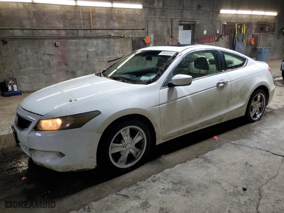 2009 Honda Accord Cpe EX-L with VIN 1HGCS22839A005448, listed as a Copart auction lot 84069934 with 112,328 mi miles and Salvage Title. Bid and sale history available at carsss.com. Image 1.