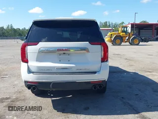 2023 GMC Yukon Denali with VIN 1GKS1DKL2PR303909, listed as a IAAI auction lot 42018679 with 65,532 mi miles. Bid and sale history available at carsss.com. Image 16.