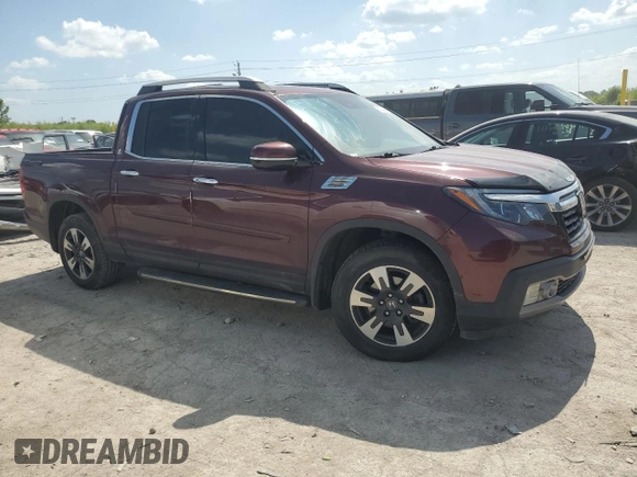 2019 Honda Ridgeline RTL-E with VIN 5FPYK3F71KB002046, listed as a Copart auction lot 61934455 with 131,674 mi miles and Salvage title. Bid and sale history available at DreamBid. Image 4.