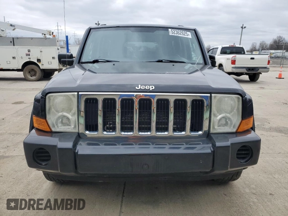 2007 Jeep Commander Sport z VIN 1J8HG48K97C527502, wystawiony jako Copart lot #52362625 z przebiegiem 156 639 mil mil oraz Czysty tytuł • Clean title. Historia ofert i sprzedaży dostępna na DreamBid. Obrazek 5.