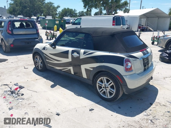 2015 MINI Convertible with VIN WMWZN3C53FT861968, listed as a IAAI auction lot 42717485 with 79,840 mi miles and . Bid and sale history available at DreamBid. Image 3.