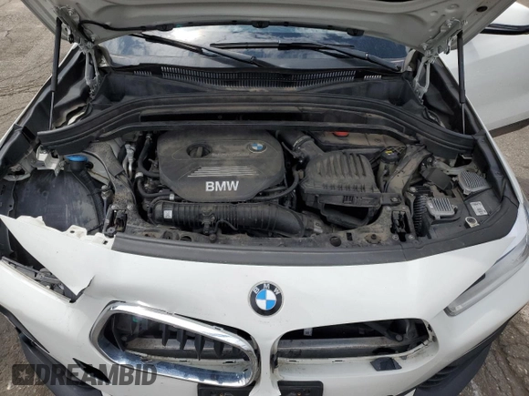 2018 BMW X2 xDrive28i z VIN WBXYJ5C38JEF79686, wystawiony jako Copart lot #56988735 z przebiegiem 103 799 mil mil oraz Szkoda całkowita • Salvage title. Historia ofert i sprzedaży dostępna na DreamBid. Obrazek 11.