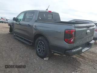 2024 Ford Ranger XLT z VIN 1FTER4HH6RLE34724, wystawiony jako IAAI lot #42256858 z przebiegiem 12 438 mil mil oraz . Historia ofert i sprzedaży dostępna na DreamBid. Obrazek 3.