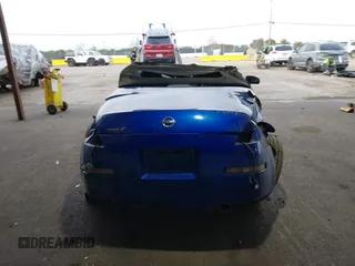 2005 Nissan 350Z Touring with VIN JN1AZ36A45M753058, listed as a IAAI auction lot 41563023 with 1 mi miles. Bid and sale history available at carsss.com. Image 16.