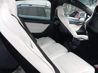 2016 Tesla Model X 70D with VIN 5YJXCAE2XGF014165, listed as a IAAI auction lot 41474490 with 112,967 mi miles. Bid and sale history available at carsss.com. Image 8.