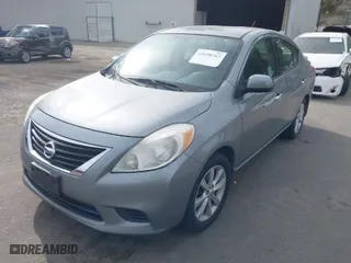 2014 Nissan Versa SV with VIN 3N1CN7AP8EL819239, listed as a IAAI auction lot 41690363 with 116,684 mi miles. Bid and sale history available at carsss.com. Image 2.
