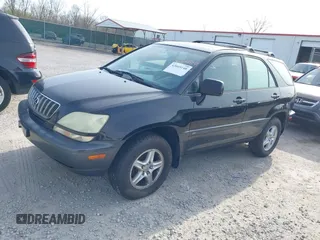 2002 Lexus RX 300 with VIN JTJHF10U720274323, listed as a IAAI auction lot 42049148 with 298,001 mi miles and . Bid and sale history available at carsss.com. Image 2.