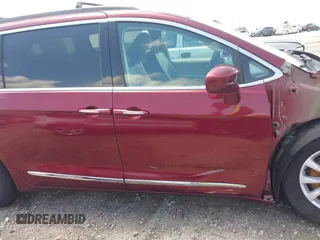2017 Chrysler Pacifica Touring L with VIN 2C4RC1BG0HR591124, listed as a IAAI auction lot 42138595 with 113,071 mi miles and . Bid and sale history available at DreamBid. Image 14.