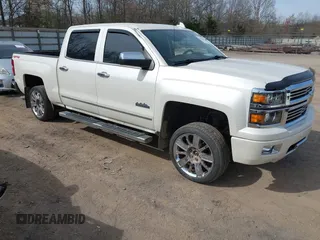 2015 Chevrolet Silverado 1500 High Country with VIN 3GCUKTEC7FG205805, listed as a IAAI auction lot 41815859 with 130,028 mi miles and . Bid and sale history available at DreamBid. Image 1.