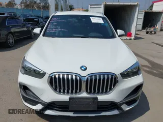 2021 BMW X1 sDrive28i z VIN WBXJG7C01M3M73496, wystawiony jako IAAI lot #42132005 z przebiegiem 23 278 mil mil oraz . Historia ofert i sprzedaży dostępna na DreamBid. Obrazek 12.