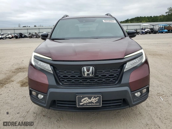 2020 Honda Passport Touring with VIN 5FNYF7H94LB001817, listed as a Copart auction lot 69430964 with 63,147 mi miles and Salvage Title. Bid and sale history available at carsss.com. Image 5.