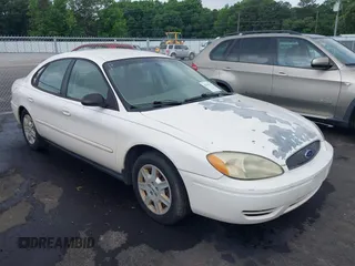 2007 Ford Taurus SE z VIN 1FAFP53U07A115368, wystawiony jako IAAI lot #42290697 z przebiegiem 206 884 mil mil oraz . Historia ofert i sprzedaży dostępna na DreamBid. Obrazek 1.