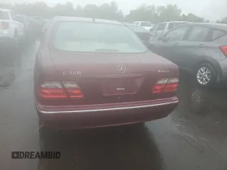 2002 Mercedes-Benz E 320 with VIN WDBJF82J22X070566, listed as a Copart auction lot 55964535 with 238,240 mi miles and Salvage Title. Bid and sale history available at DreamBid. Image 6.