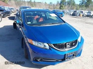 2014 Honda Civic Si with VIN 2HGFB6E55EH700855, listed as a IAAI auction lot 41974580 with 125,270 mi miles and . Bid and sale history available at DreamBid. Image 13.