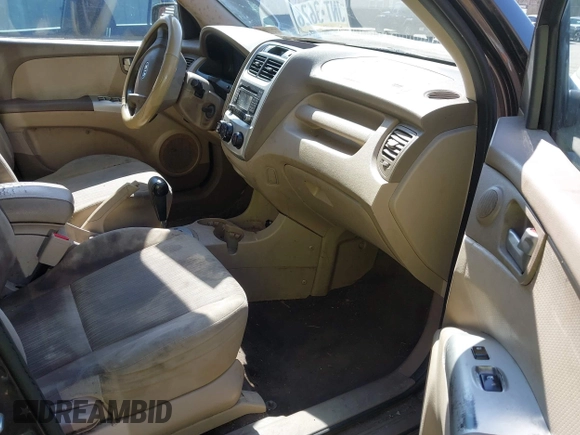 2010 Kia Sportage LX with VIN KNDKGCA32A7669068, listed as a IAAI auction lot 41783154 with 168,226 mi miles and . Bid and sale history available at carsss.com. Image 5.
