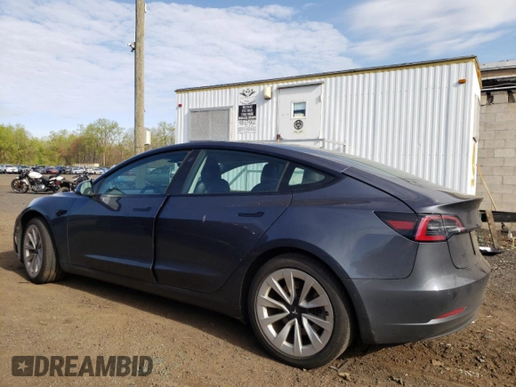 2022 Tesla Model 3 Long Range z VIN 5YJ3E1EB6NF290946, wystawiony jako Copart lot #54937825 z przebiegiem 111 044 mil mil oraz Szkoda całkowita • Salvage title. Historia ofert i sprzedaży dostępna na DreamBid. Obrazek 2.