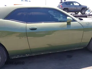 2020 Dodge Challenger SXT with VIN 2C3CDZAG8LH113023, listed as a IAAI auction lot 41969996 with 95,437 mi miles and . Bid and sale history available at DreamBid. Image 14.